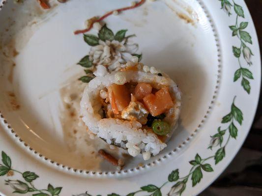 2 tiny chunks of fish with more cream cheese than anything else.