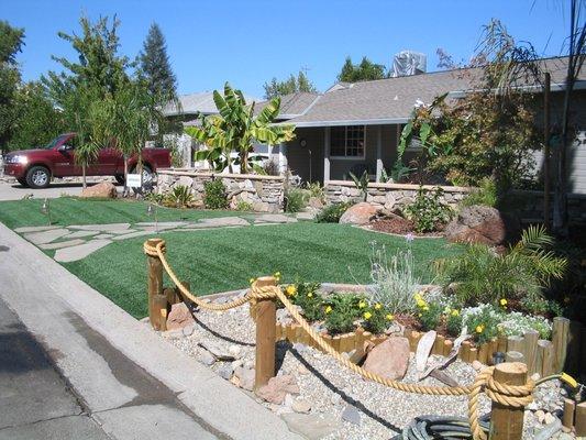 Incredible front lawn renovation - Mediterranean gardens and flagstone walkway (from right side) (2004)