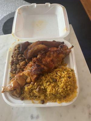 Bbq Chicken, rice and peas, beans, and plantains