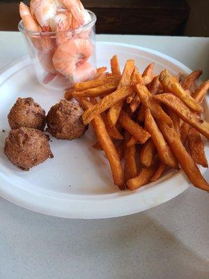 Boiled shrimp, hushpuppies, and sweet potato fries