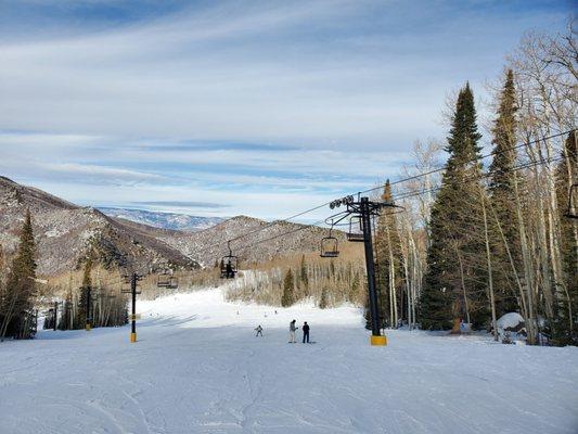 Going down the slope after getting dropped via lift. My first time doing such a long stretch on my own. The pic doesn't capture all of it.