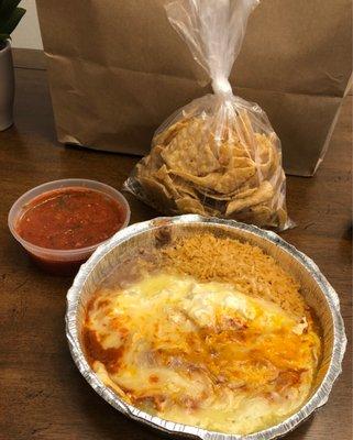 beef enchiladas with rice and refried beans and fresh chips with a great flavorful salsa