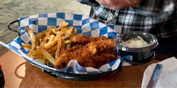 Dinner chicken tenders with fries and slaw