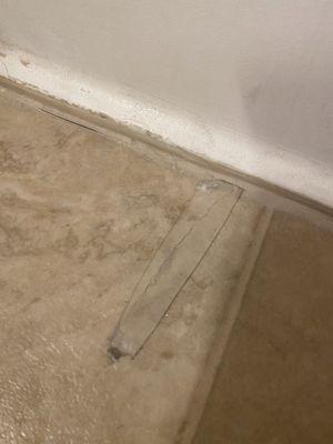 How they "fix" floors. With tape.