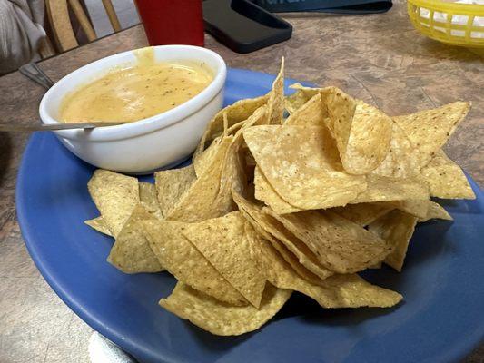 Chips and Queso, don't be stingy on the chips!