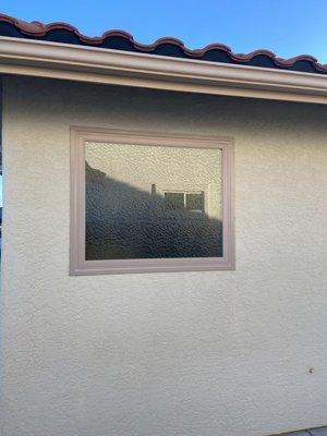 The fixed bathroom window replacing decayed acrylic block. Great texture.