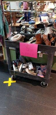 Shoe bargain cart.