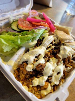 Chicken & Rice bowl w/ side salad.