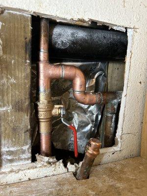 New shut off valve in the wall next to the ABS drain line!