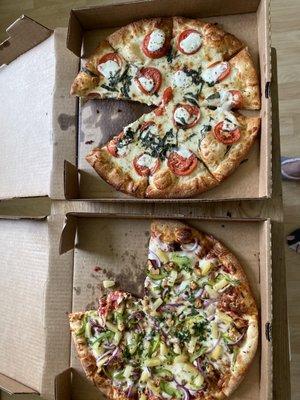 Classic Margherita and Jamaican Jerk Chicken pizzas.