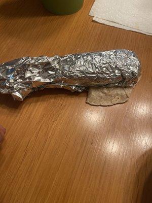 A poorly wrapped burrito shell