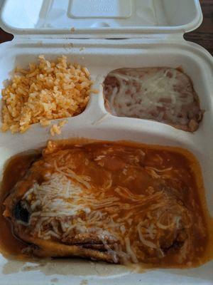 The smallest portion of rice and beans I've ever seen on a dinner plate