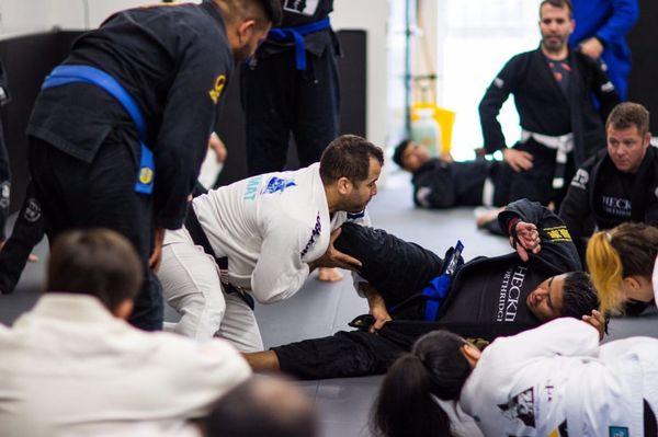 Black Belt Leo teaching a technique