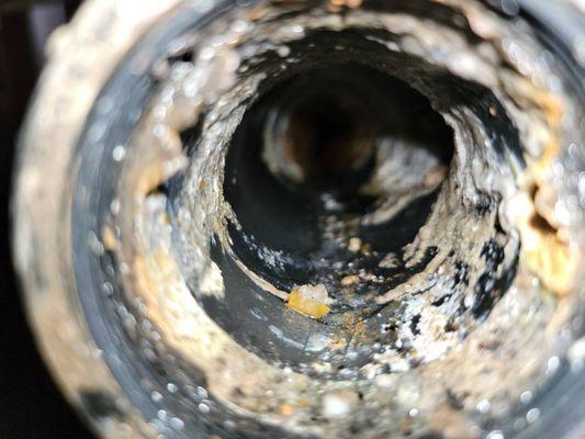 Drain cleaning in crawl space