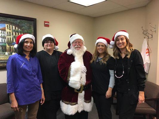 Santa stopped by our office! With all those Christmas cookies even he needs a good dentist!