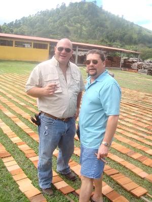 Christopher Mey, Director of International Sales for Rocky Patel, and Paul Davis, of JR Cigars in Clayton, MO, the box factory.