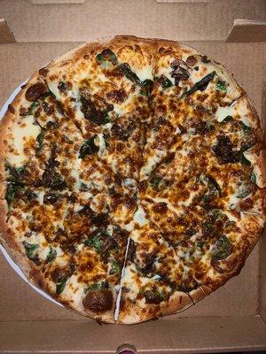 Large pizza w/ Alfredo sauce base, topped with spinach & mushrooms