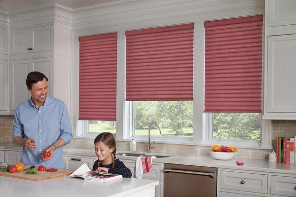 Roman shades soften any window setting.