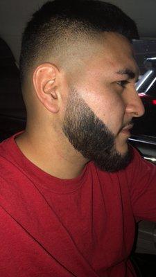 Colored, fades and lined up beard with the straight razor