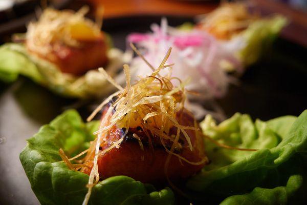 Miso broiled Big Glory Bay king salmon (butter lettuce, crispy leeks, citrus)