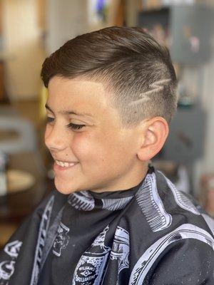 Fresh childrens cut with lightening bolt