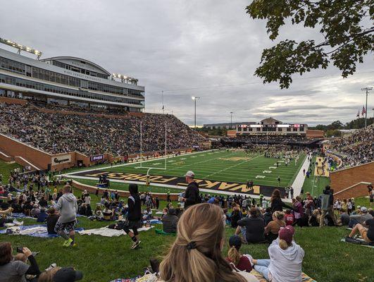 View of the football field from behind Deacon Hill. Southeast end zone.