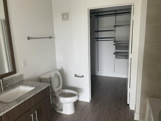 Walk in closet and bathroom