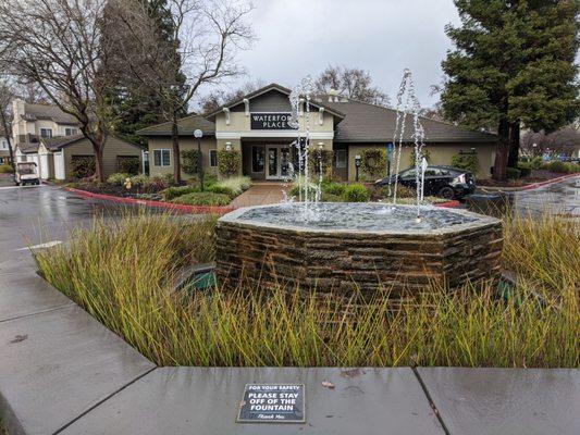 Fountain out front past entrance.