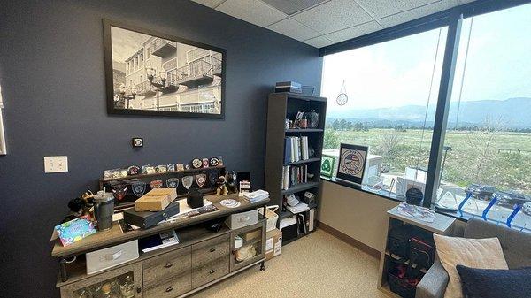 Real Estate Academy of Colorado Carrie Lukins office wall