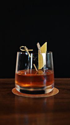 Sazerac Rye whisky, turbinado sugar, Peychaud's Bitters, Absinthe, lemon peel