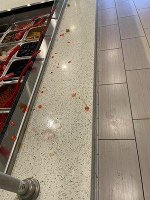 Area in front of the fruit bar. Not cleaned once while we were there.