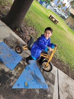 Tricycles build gross motor skills.