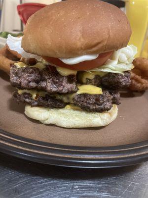 Double Trump Burger! With onion rings! That's a pound of burger! Wow. If your hungry this will fill you up!