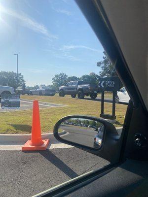 The drive-through with five cars in front of me.