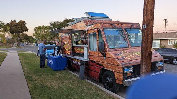 The food truck outside a promotion for gigabit now.