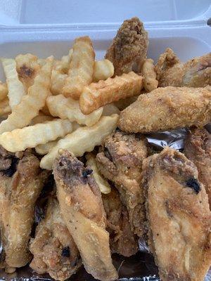 Chicken wings and fries