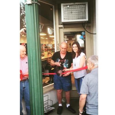 Jack the Barber and his Granddaughter Lynn. Celebrating our grand re-opening ribbon cutting & 70 year anniversary.