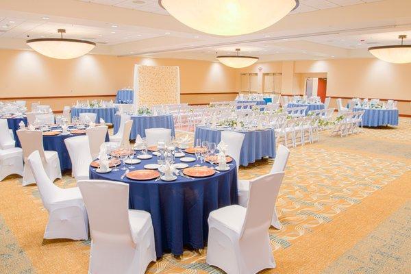 Indoor wedding reception and ceremony.