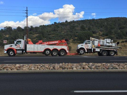 The heavy duty towing an APS truck.