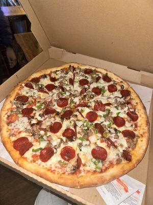 Three 3 Toppings Pizza: pepperoni, sausage, bell peppers