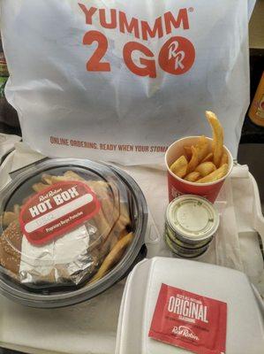 2Go is very nicely packaged! Extra Garlic Fries in the container and more extra fries... And Red Robin's fry seasoning ;)