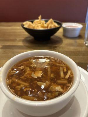 Hot & Sour Soup with a side bowl of fried egg roll chips. It was good