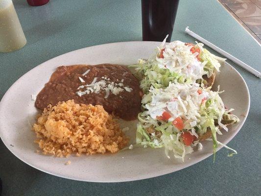 Vegetarian Tacos with avocado, cactus, lettuce, tomato, cheese, salsa, etc