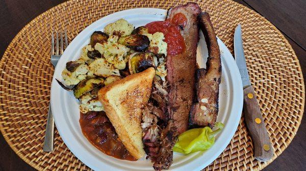 Mixed plate: Ribs, brisket and pulled pork with 4 sides and sauce, then we added oven-roasted vegetables.