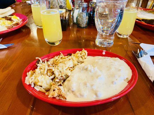 Nora's Biscuits & Gravy   Half Order Hash Browns and of course mimosas