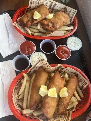 The cod fish and chips and the salmon fish and chips