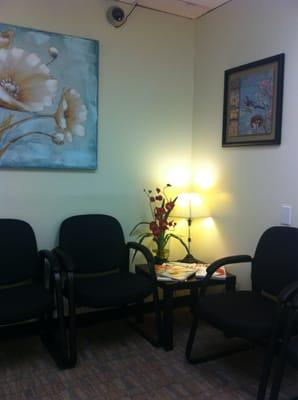 Comfy and cool waiting room with lots to read.