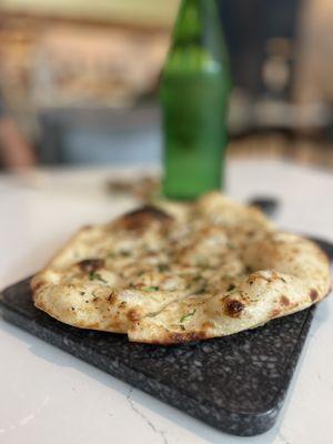 The warmest, crispiest fresh garlic cilantro Naan