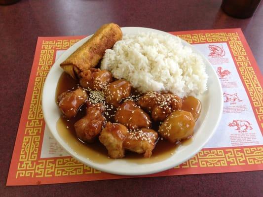 Sesame Chicken with steamed rice and egg roll