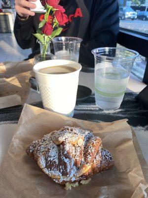 Almond croissant and Americano deliciousness